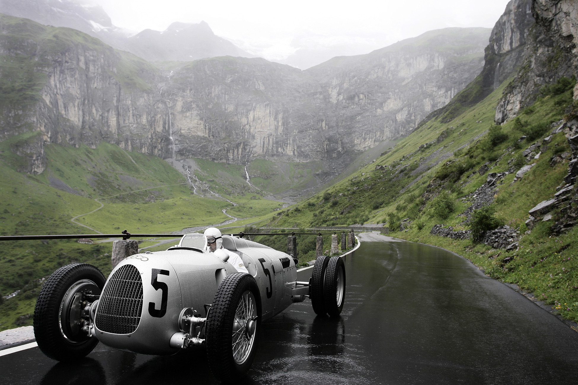 Klausen Pass, Switzerland - Classic 1937 Auto Union C-type races the Klausen Pass, Switzerland.