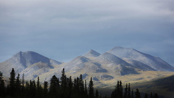 The Noatak River in the Brooks Ranges National Park, Alaska, USA. The Noatak River is located high up in the Arctic Circle and during the winter months when temperatures can drop to minus 60 degrees Celsius life can be excruciatingly difficult.Surrounded by the two and a half thousand meter peaks of the Brooks Ranges the Noatak cuts its way through untouched valleys as it descends into the open tundra, where it widens, twists and turns before entering a delta at its mouth over 600km away in the Chukchi Sea just a short paddle from Russia