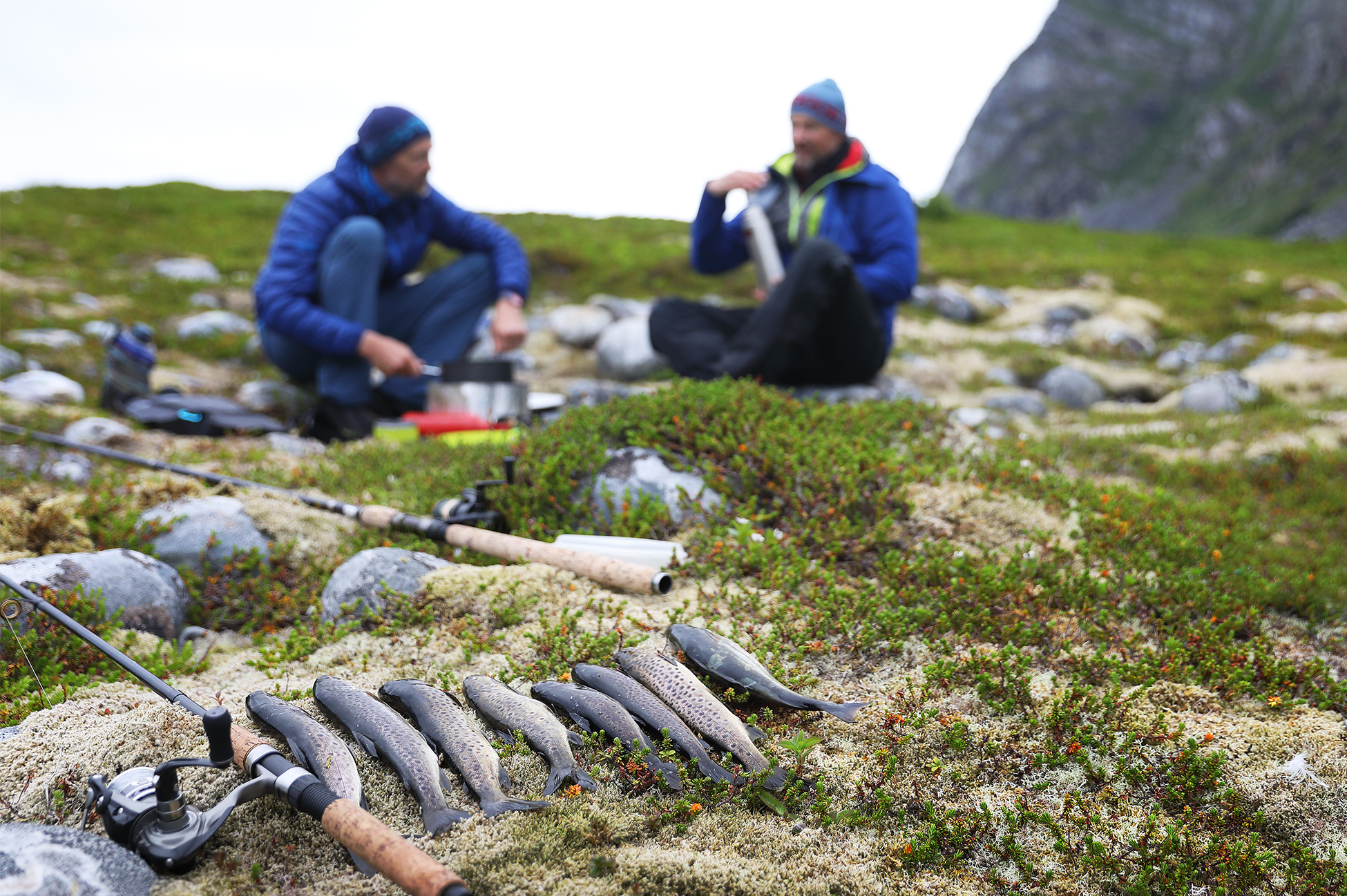 Abundant Fishing in the northern Norway lakes. Stand Up Paddling Under the Midnight sun