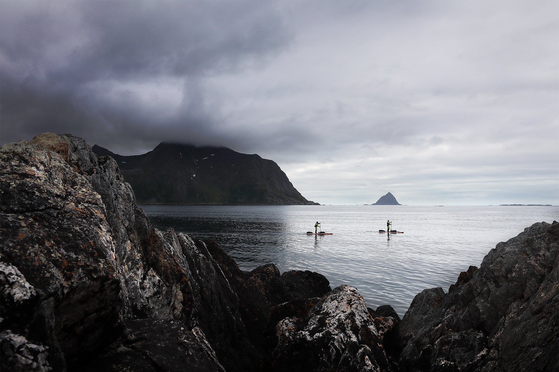 Stand up paddling in Norway under the Midnight Sun. Discover glowing fjords, Arctic landscapes, and unforgettable SUP adventures above the Arctic Circle.