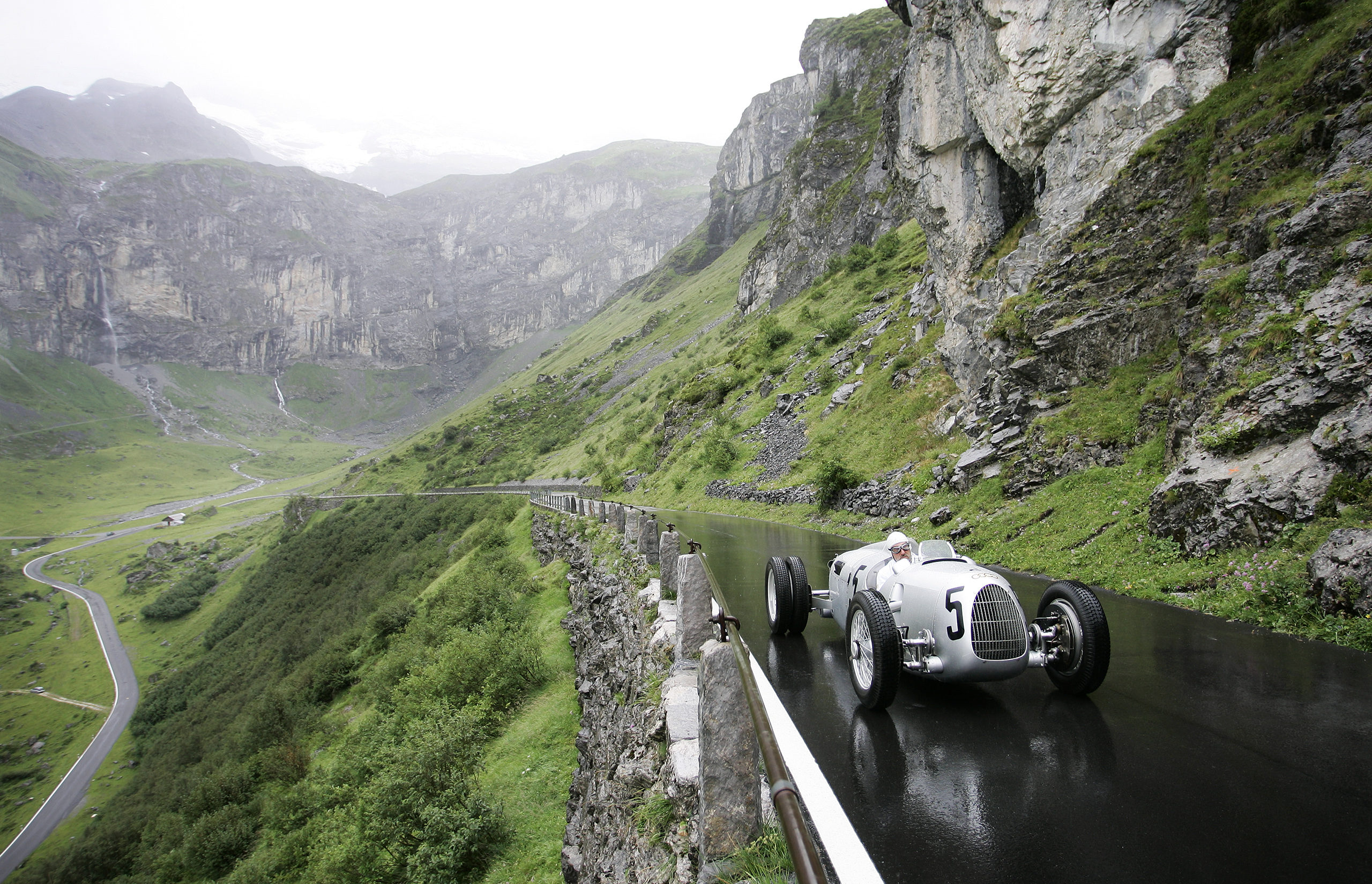 Zurich photographer Justin Hession Photography Portrait photographer and Travel photographer photographing Classic 1937 Auto Union C-type races the Klausen Pass, Switzerland. The best racers in the world came together every year from 1922 to 1934 to race the Klausen Pass. Past performances by historic racers include Caracciola, Stuck, Nuvolari, Chiron and many more memorable names at the Klausen.